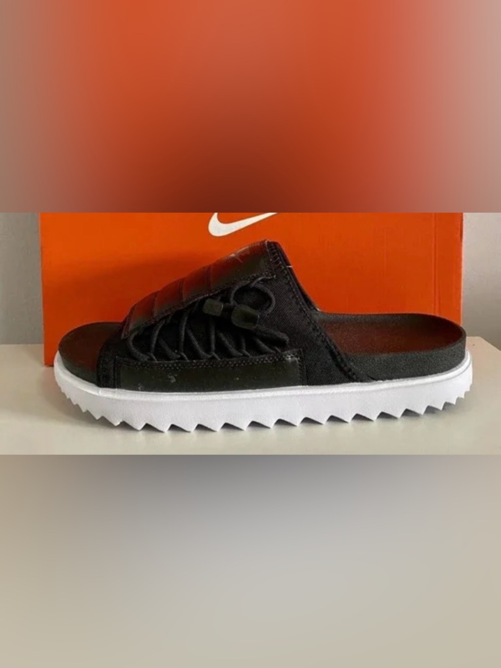 Nike Black Low-Profile Sneakers with White Sawtooth Sole